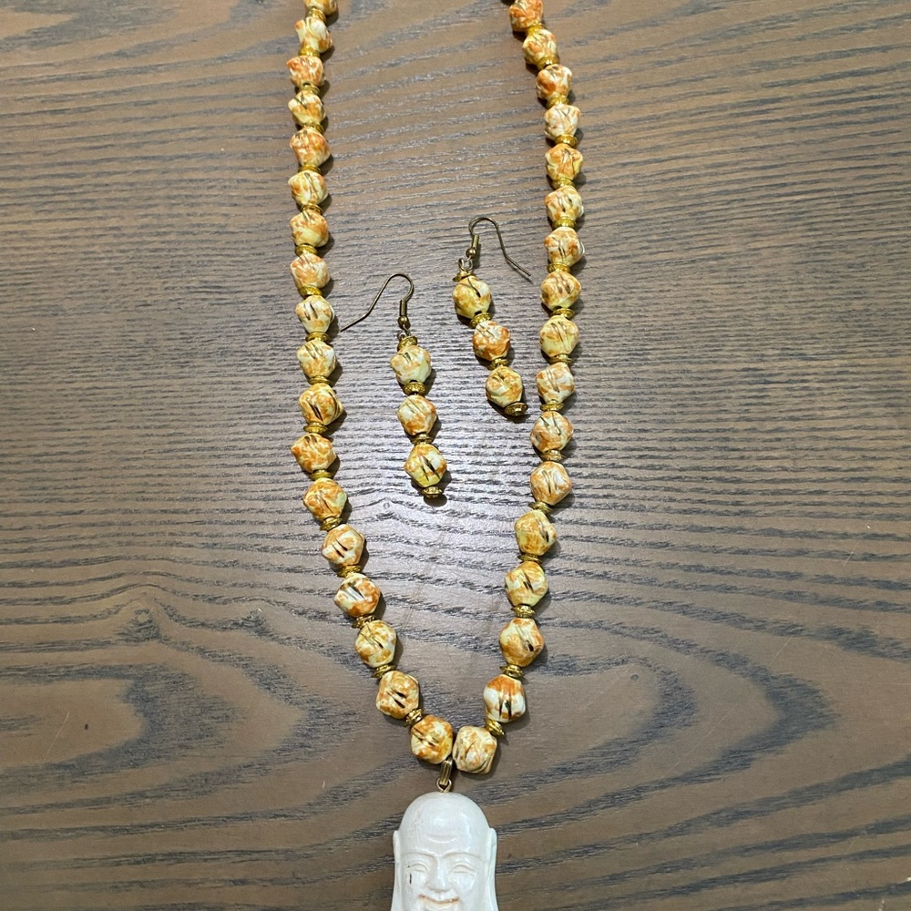 Women’s necklace and earrings. Hand crafted and designed by Quinn and Flynn